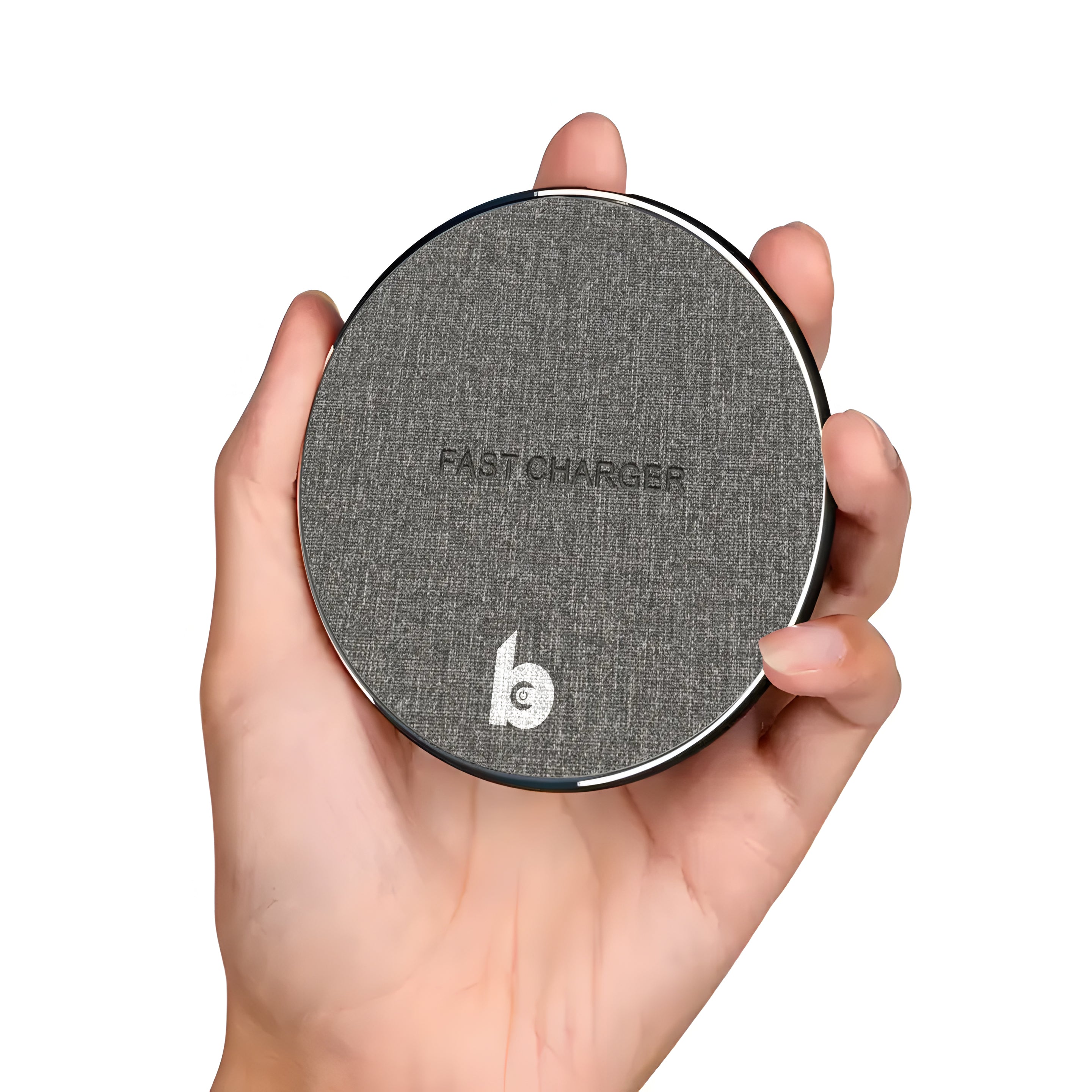 Magnetische draadloze bureau lader - vastgehouden in hand
